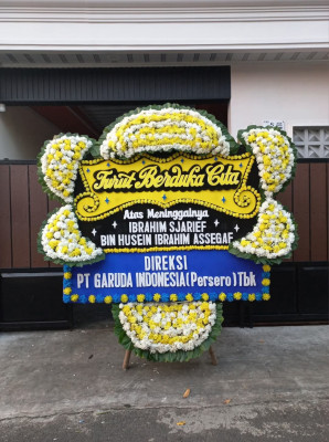Papan Bunga Duka di Sisik